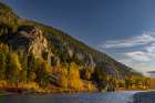 Autumn color along the Flathead River at Bad Rock Canyon in Hungry Horse, Montana, USA Art Print